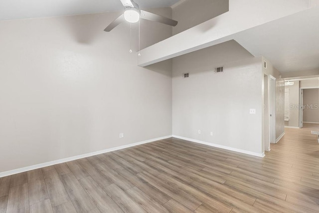 2825 NW 104th Ct Unit B, Gainesville, FL 32606 - unfurnished room with wood finished floors, baseboards, and ceiling fan