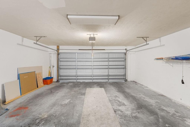 2825 NW 104th Ct Unit B, Gainesville, FL 32606 - garage featuring a garage door opener