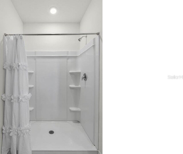 3585 Roden Rd, Haines City, FL 33844 - full bathroom with curtained shower
