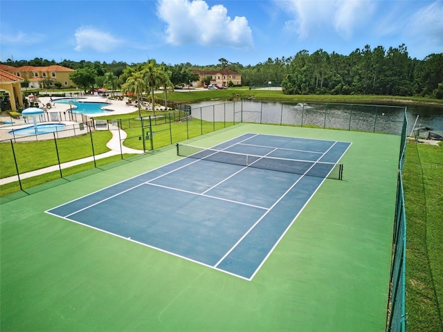 436 Caraway Dr, Kissimmee, FL 34759 - view of tennis court featuring a water view and a community pool