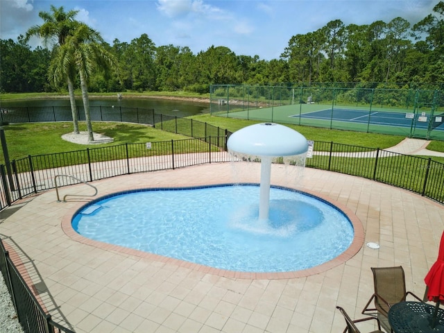 436 Caraway Dr, Kissimmee, FL 34759 - view of swimming pool featuring a water view and a tennis court