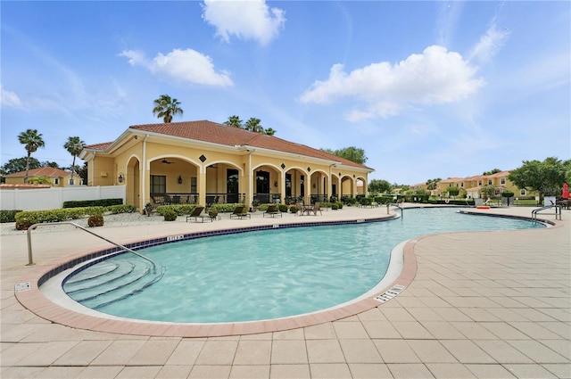 436 Caraway Dr, Kissimmee, FL 34759 - community pool featuring a patio