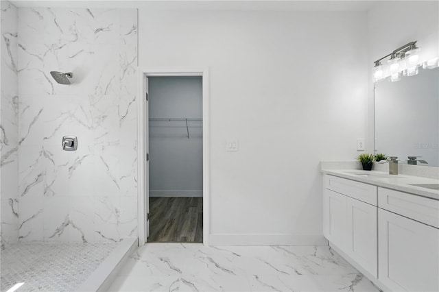 436 Caraway Dr, Kissimmee, FL 34759 - full bath with double vanity, a marble finish shower, marble finish flooring, and a walk in closet