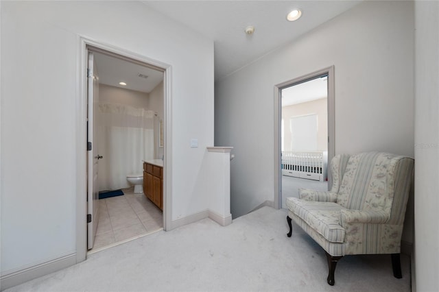 8108 Via Bella Notte, Orlando, FL 32836 - living area featuring light colored carpet, an upstairs landing, baseboards, heating unit, and recessed lighting