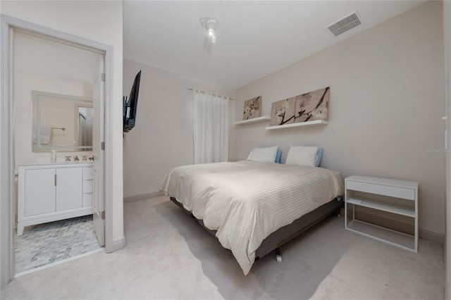 8108 Via Bella Notte, Orlando, FL 32836 - bedroom with light carpet and connected bathroom