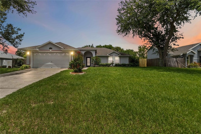 176 Hidden View Dr, Groveland, FL 34736 - ranch-style home with driveway and a garage