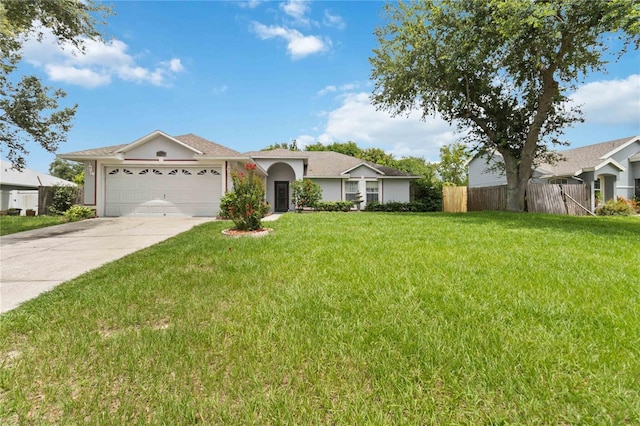 176 Hidden View Dr, Groveland, FL 34736 - ranch-style house featuring an attached garage, driveway, and stucco siding