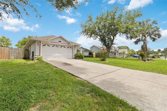 176 Hidden View Dr, Groveland, FL 34736 - ranch-style house featuring driveway, stucco siding, and an attached garage