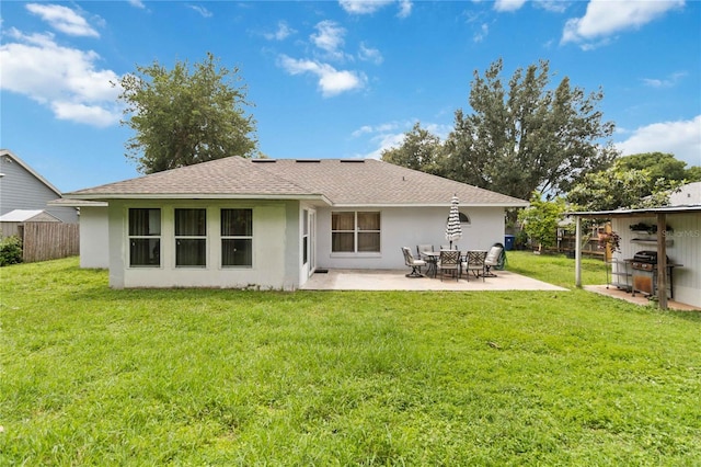 176 Hidden View Dr, Groveland, FL 34736 - back of house featuring stucco siding, a patio area, and a shingled roof