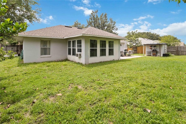 176 Hidden View Dr, Groveland, FL 34736 - back of property featuring stucco siding, a patio area, and a shingled roof