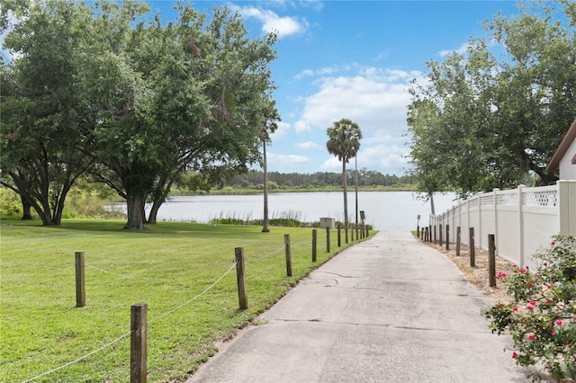 176 Hidden View Dr, Groveland, FL 34736 - view of community featuring a water view