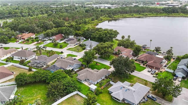 176 Hidden View Dr, Groveland, FL 34736 - aerial perspective of suburban area with a large body of water and a forest