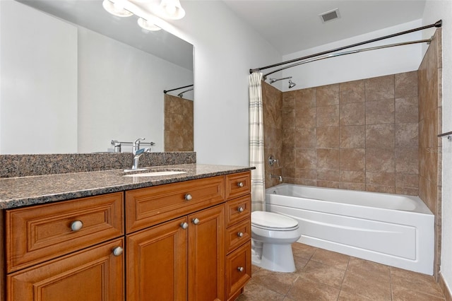 150 E Robinson St Unit 1023, Orlando, FL 32801 - bathroom featuring vanity, shower / tub combo with curtain, and tile patterned flooring