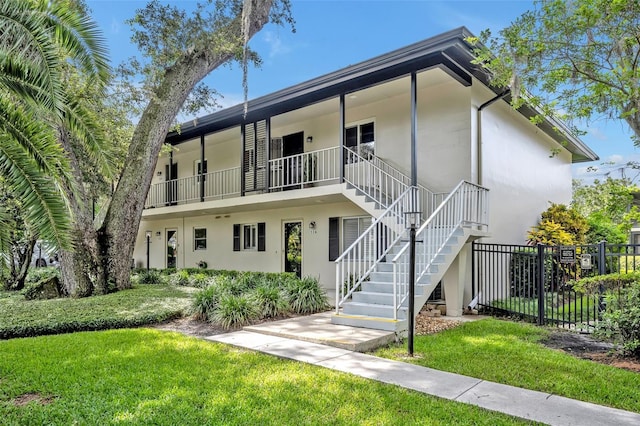 210 Magnolia Rd Unit 214, Maitland, FL 32751 - multi unit property with stucco siding and stairway