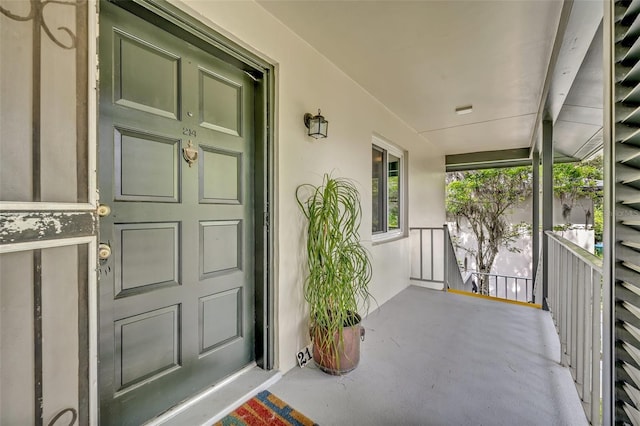 210 Magnolia Rd Unit 214, Maitland, FL 32751 - entrance to property with a porch and stucco siding