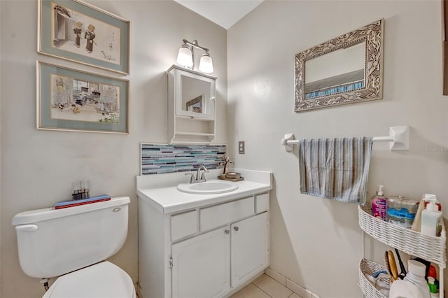 210 Magnolia Rd Unit 214, Maitland, FL 32751 - half bath featuring tasteful backsplash, vanity, and tile patterned flooring