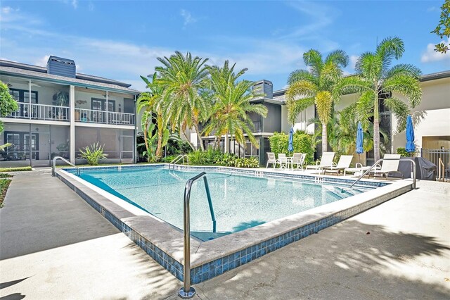 210 Magnolia Rd Unit 214, Maitland, FL 32751 - community pool featuring a patio area