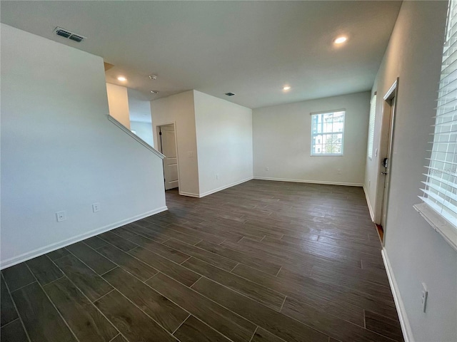 15579 Water Spring Blvd, Winter Garden, FL 34787 - spare room with dark wood-style flooring and recessed lighting