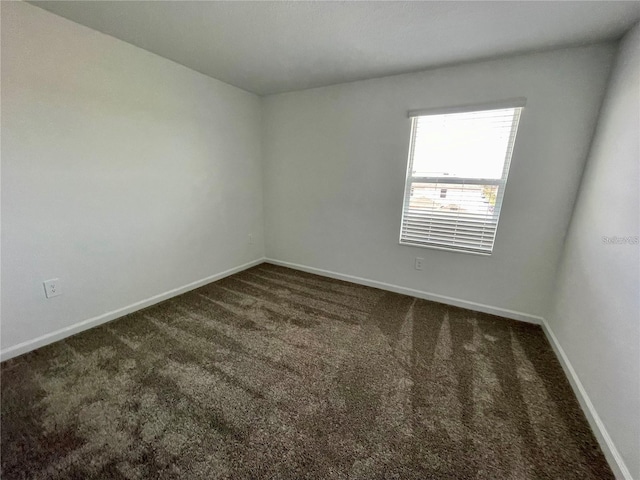 15579 Water Spring Blvd, Winter Garden, FL 34787 - empty room featuring carpet floors and baseboards