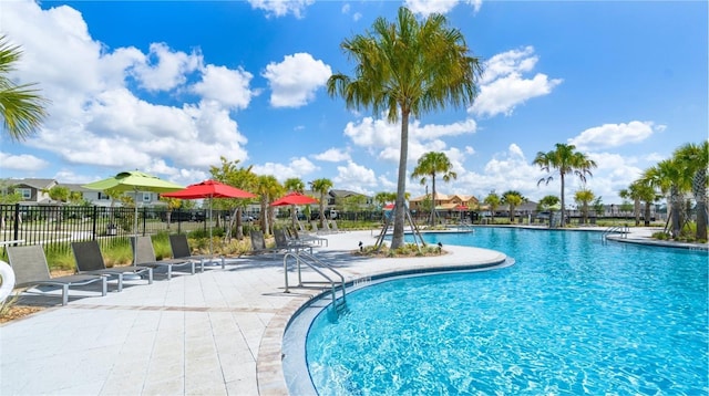 15579 Water Spring Blvd, Winter Garden, FL 34787 - community pool featuring a patio