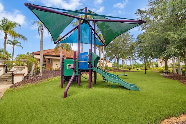 381 Cabello Dr, Davenport, FL 33837 - community jungle gym featuring a yard
