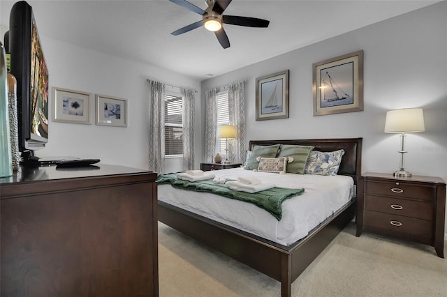 381 Cabello Dr, Davenport, FL 33837 - bedroom featuring light carpet and a ceiling fan