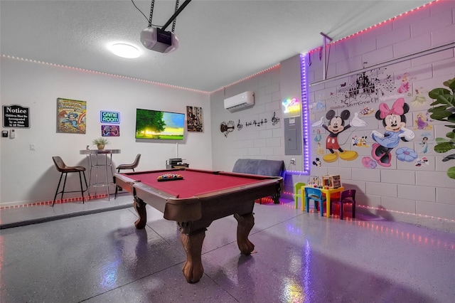 381 Cabello Dr, Davenport, FL 33837 - playroom featuring a wall unit AC, electric panel, billiards table, and baseboards