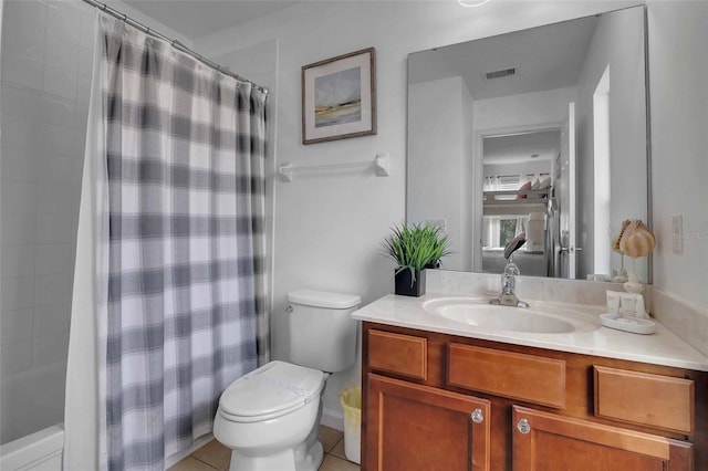 381 Cabello Dr, Davenport, FL 33837 - bathroom featuring vanity, toilet, shower / bathtub combination with curtain, and tile patterned floors