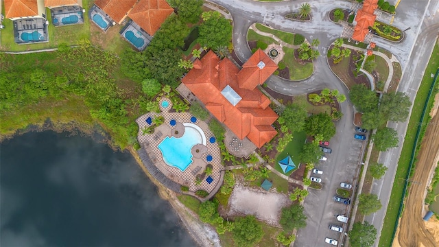 381 Cabello Dr, Davenport, FL 33837 - drone / aerial view of a pool area and a large body of water