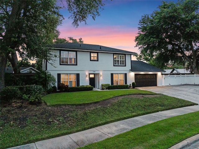1105 Appleton Ave, Orlando, FL 32806 - colonial home with a garage and driveway