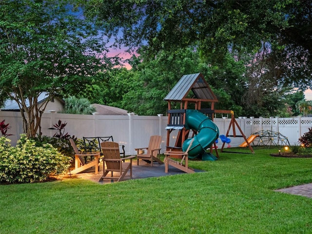 1105 Appleton Ave, Orlando, FL 32806 - playground at dusk with a fenced backyard and a playground