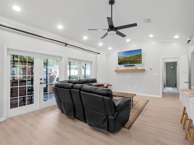 1105 Appleton Ave, Orlando, FL 32806 - living area featuring ornamental molding, ceiling fan, light wood finished floors, lofted ceiling, and recessed lighting