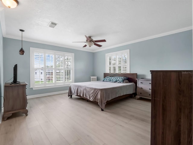 1105 Appleton Ave, Orlando, FL 32806 - bedroom featuring ornamental molding, light wood-style floors, and ceiling fan