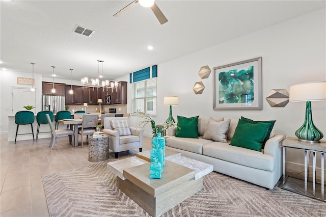 363 Miro Dr, Davenport, FL 33837 - living area featuring a ceiling fan, recessed lighting, a chandelier, and light tile patterned flooring