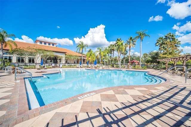 363 Miro Dr, Davenport, FL 33837 - community pool with a patio area
