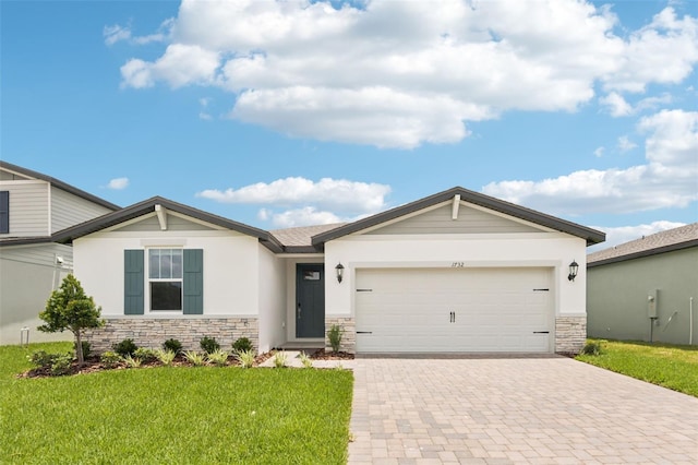 1732 Brekey Way, Zephyrhills, FL 33541 - ranch-style house with stone siding, decorative driveway, a front yard, an attached garage, and stucco siding