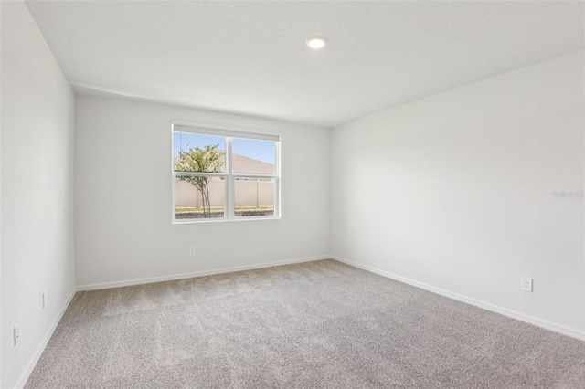 1732 Brekey Way, Zephyrhills, FL 33541 - carpeted empty room featuring baseboards