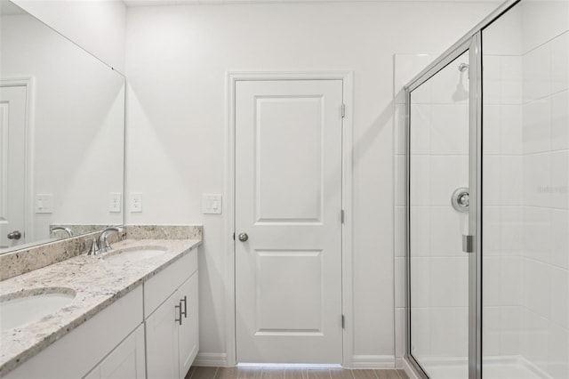 1732 Brekey Way, Zephyrhills, FL 33541 - bathroom featuring double vanity and a shower stall