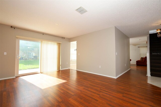 2205 Wyndam Way, Kissimmee, FL 34743 - unfurnished room with plenty of natural light and wood finished floors