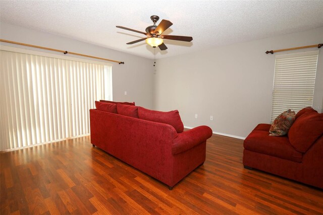 2205 Wyndam Way, Kissimmee, FL 34743 - living area with wood finished floors, ceiling fan, and a textured ceiling