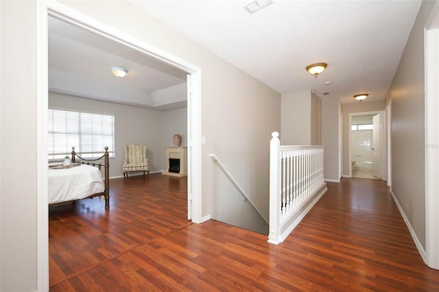 2205 Wyndam Way, Kissimmee, FL 34743 - hall with an upstairs landing and wood finished floors