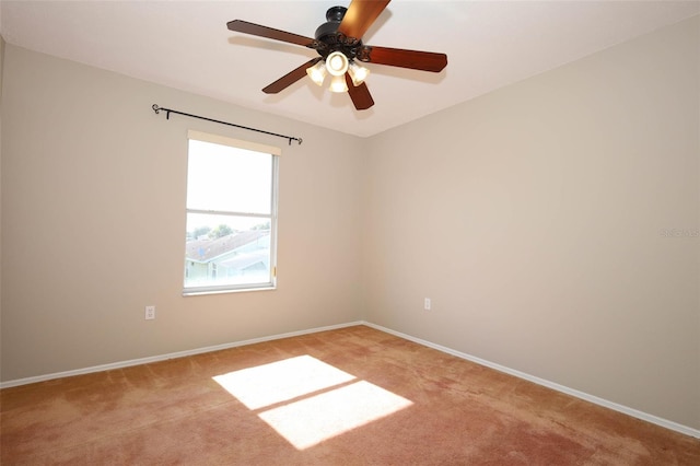 2205 Wyndam Way, Kissimmee, FL 34743 - empty room featuring light colored carpet and a ceiling fan