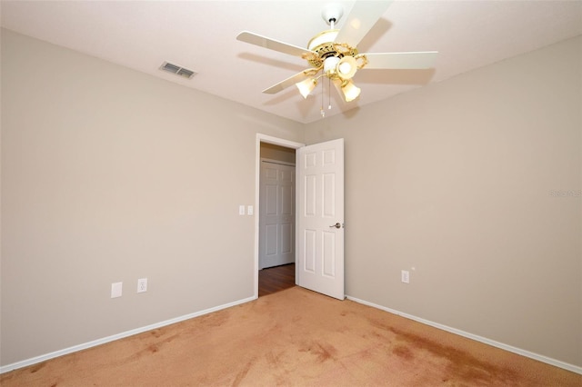 2205 Wyndam Way, Kissimmee, FL 34743 - spare room with light carpet and ceiling fan