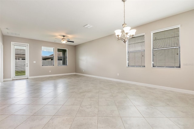 13209 Haystack Ct, Riverview, FL 33579 - empty room with a chandelier, a ceiling fan, and light tile patterned floors