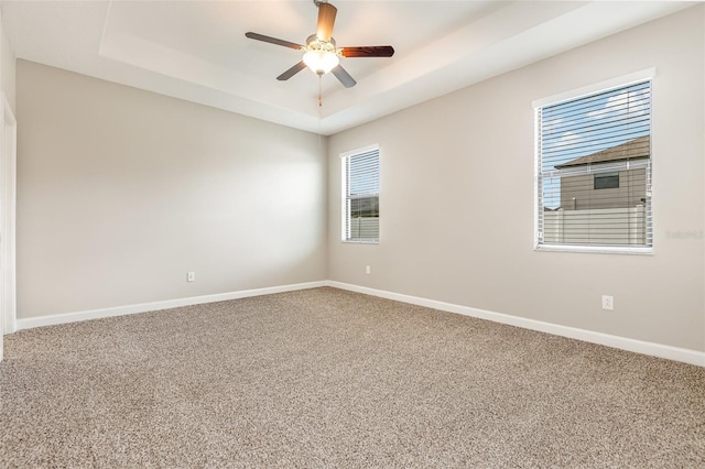 13209 Haystack Ct, Riverview, FL 33579 - carpeted empty room featuring a raised ceiling and ceiling fan