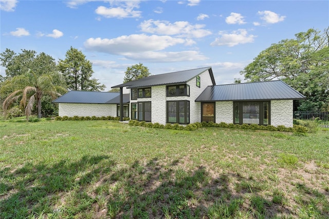 8735 Rancho Ct, Orlando, FL 32836 - view of front facade featuring metal roof and stone siding