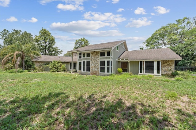 8735 Rancho Ct, Orlando, FL 32836 - rear view of house with stone siding