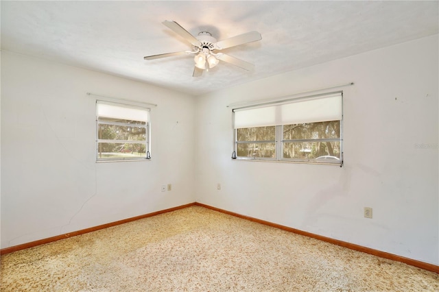 1607 Lindale Ave, Eustis, FL 32726 - empty room with ceiling fan and baseboards