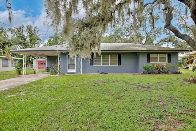 1607 Lindale Ave, Eustis, FL 32726 - single story home featuring driveway, a front yard, a carport, and concrete block siding
