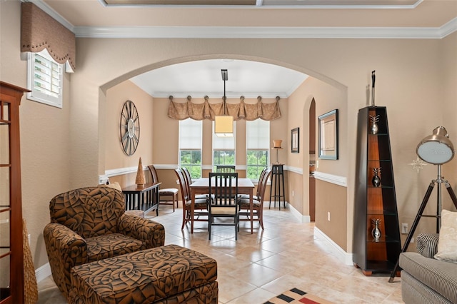 600 Egret Place Dr, Winter Garden, FL 34787 - dining space featuring arched walkways, ornamental molding, light tile patterned floors, and baseboards